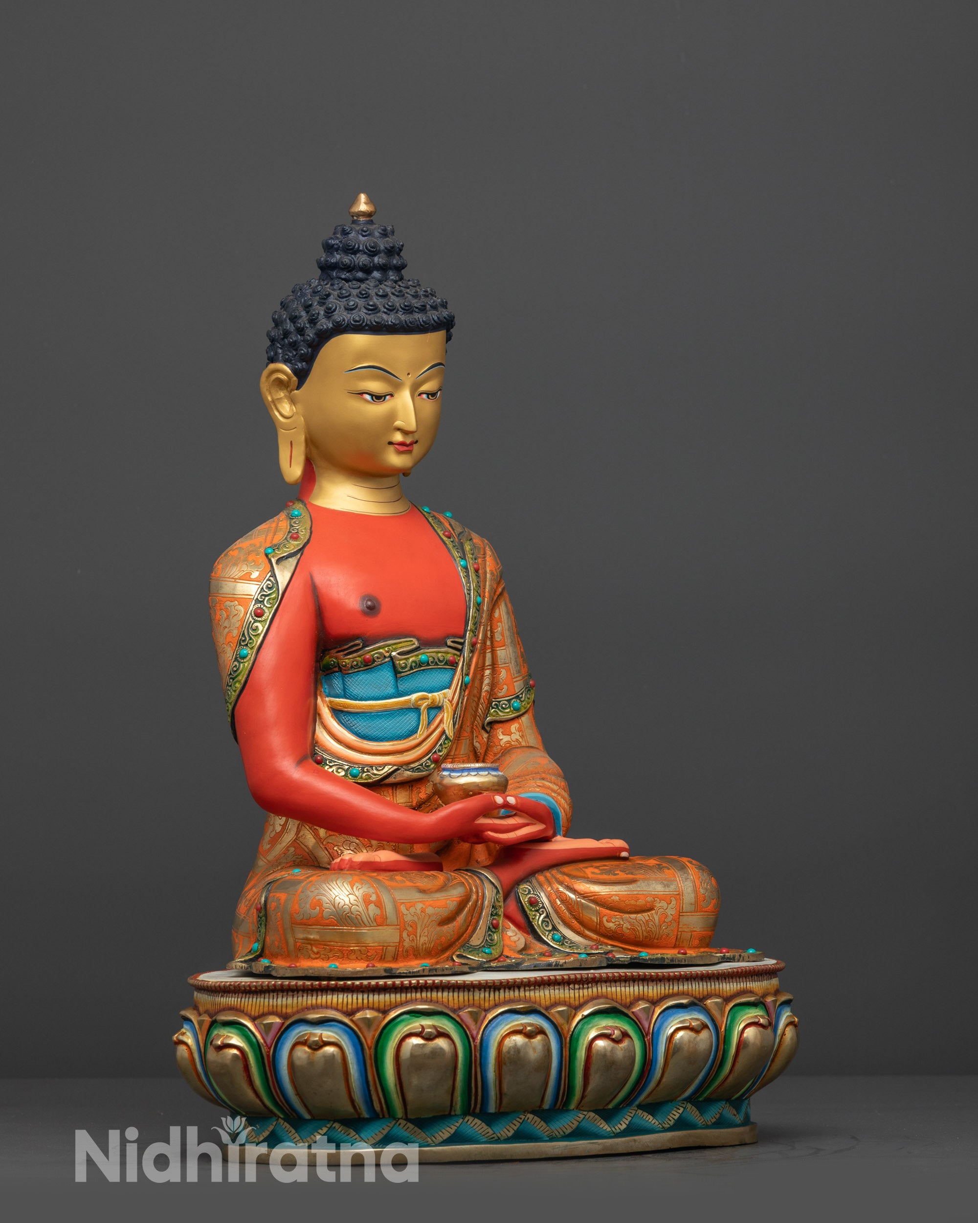 side view Amitabha Buddha Statue holding monk's bowl seated on multi-coloured lotus seat
