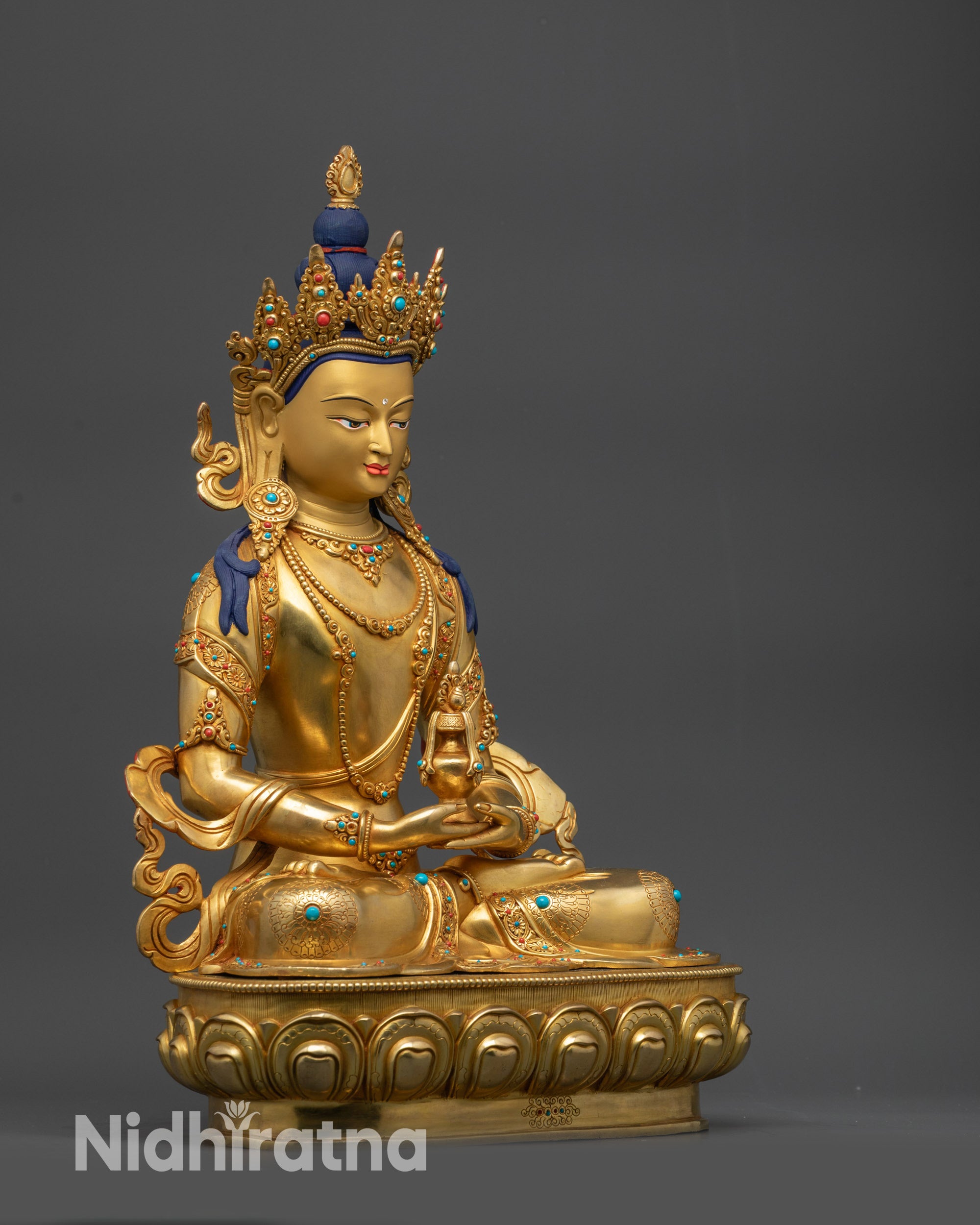 side view Amitayus long life Buddha statue on lotus pedestal, Nepalese Newari craftsmanship
