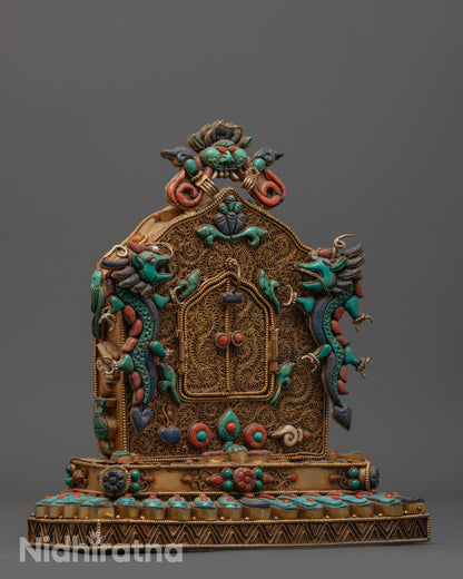 side view Buddha Shakyamuni Ghau Box with intricate copper filigree and auspicious motifs