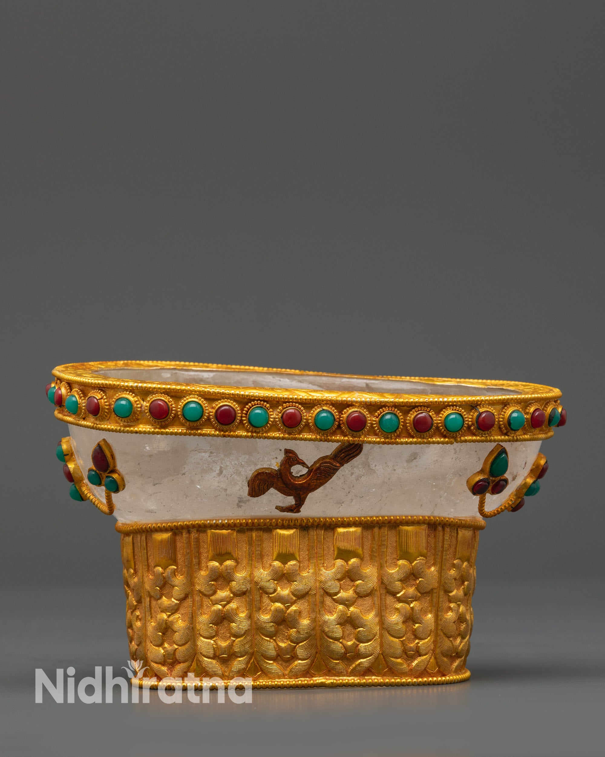 side view Crystal Kapala adorned with gemstones and intricate ritual carvings

