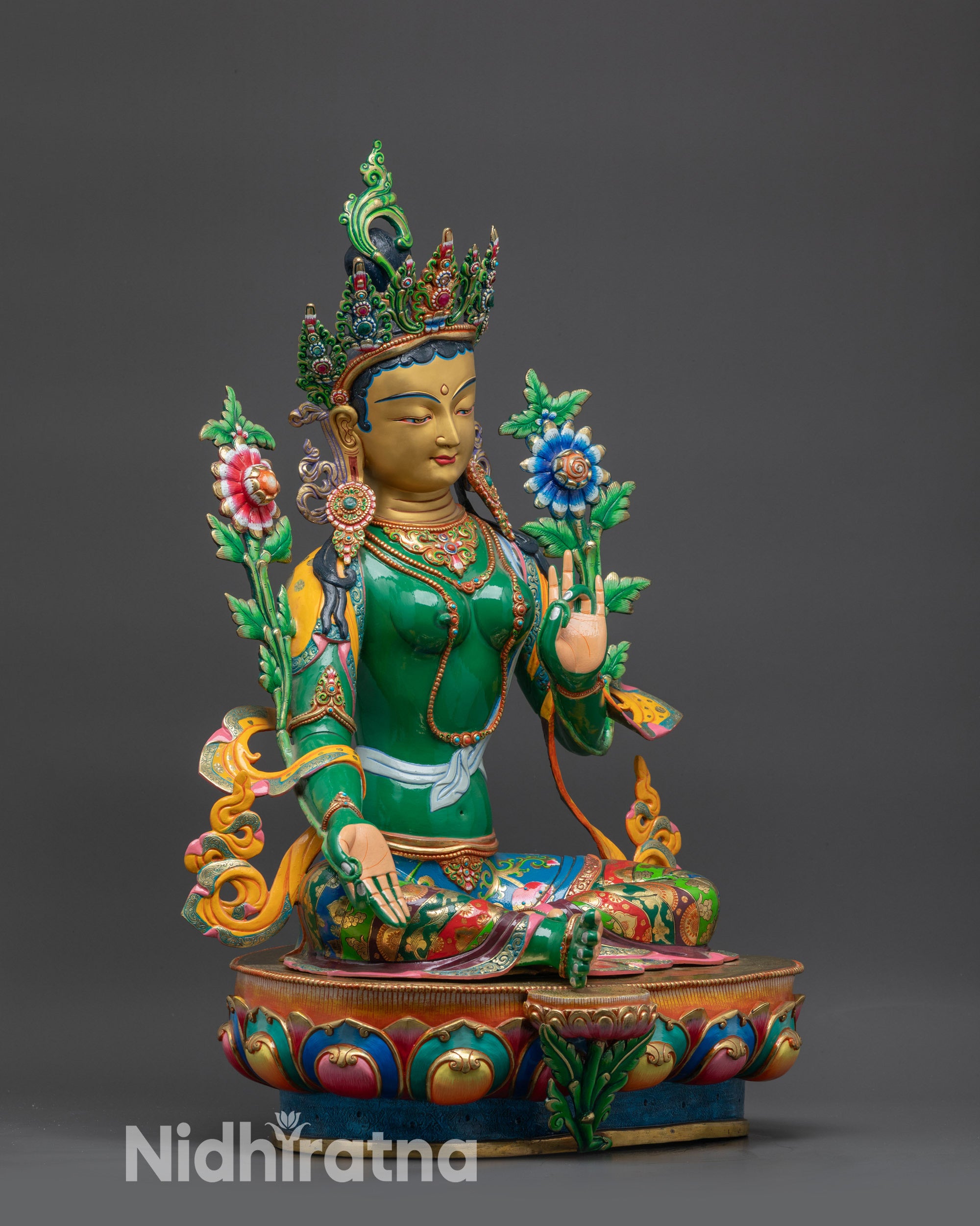side view Divine Green Tara Statue seated in royal ease posture on lotus base
