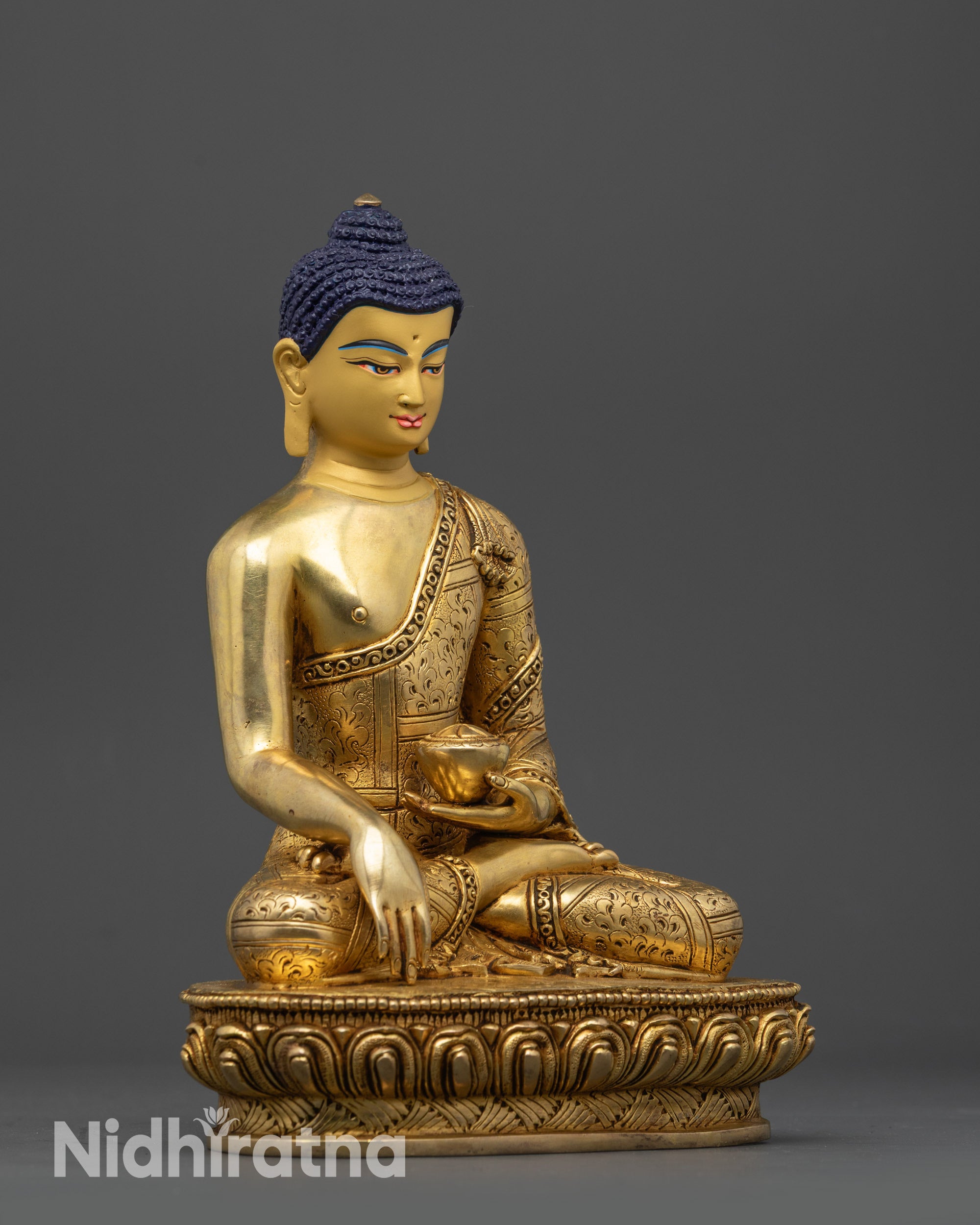 side view Golden Shakyamuni Buddha Statue with intricate monk’s robe and lotus base carvings