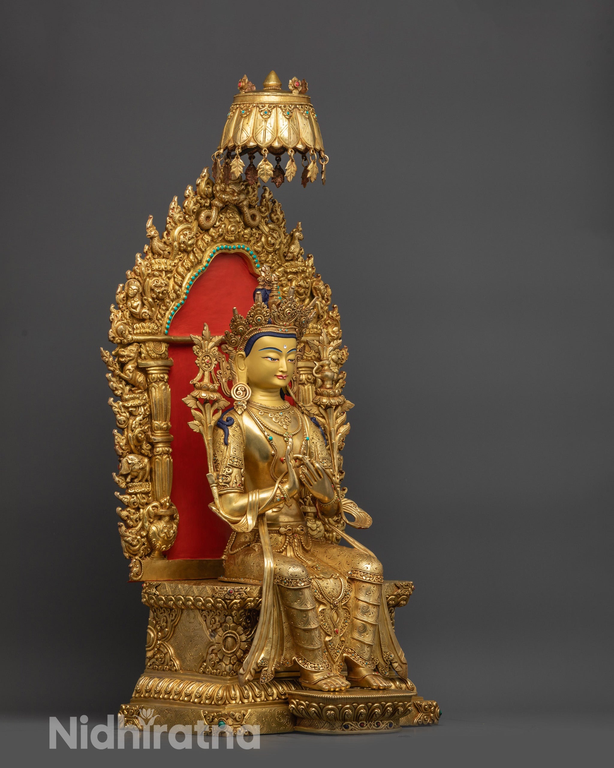 side view Maitreya Buddha Statue with lotus seat throne and flowing robe
