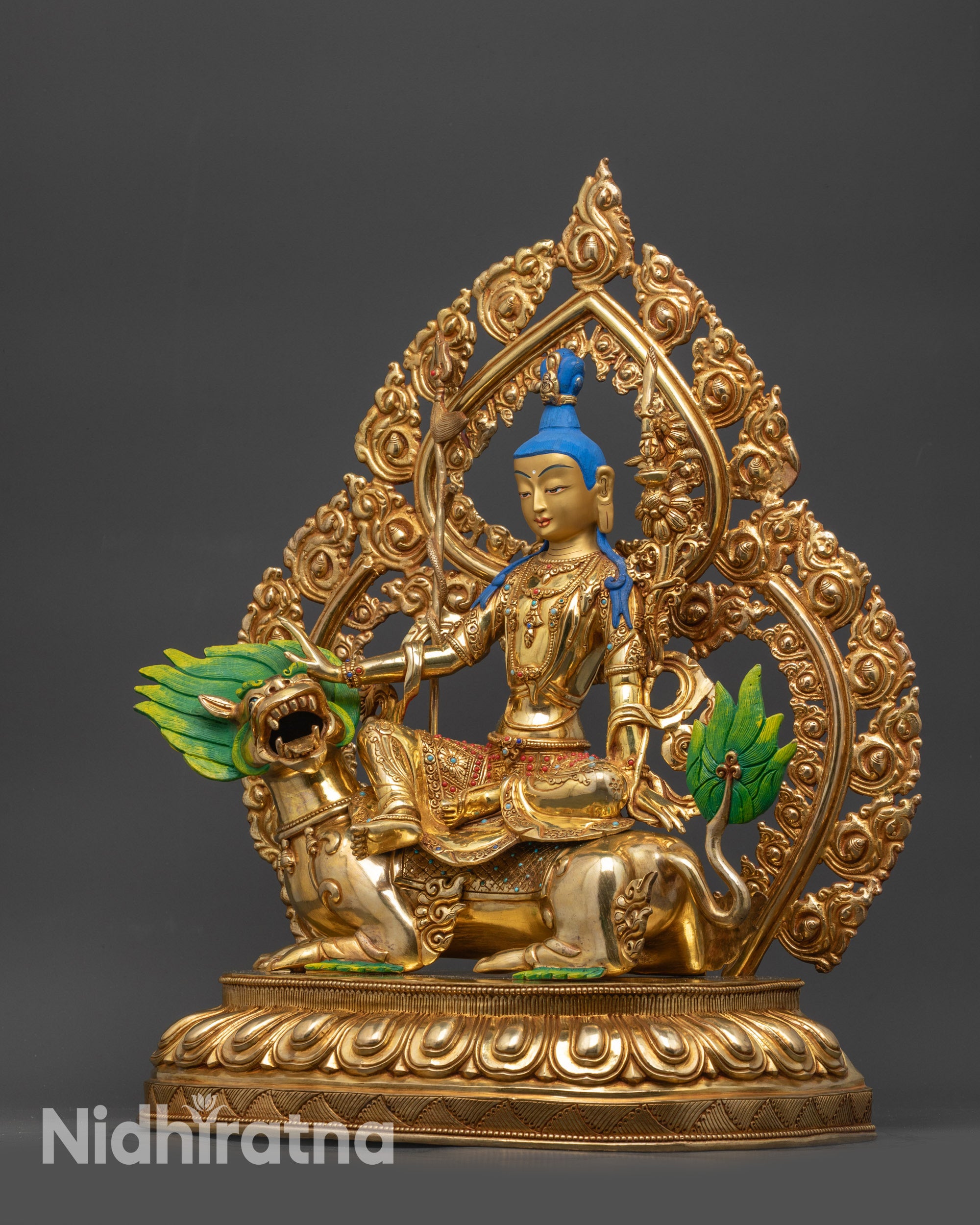 side view Simhanada Chenrezig seated in royal ease on snow lion atop lotus seat

