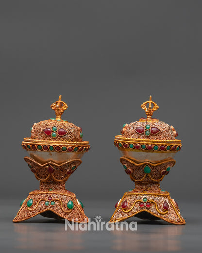 side view Tibetan Kapala Set showing copper base and intricate gold-plated filigree work
