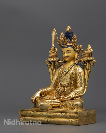 side view Tibetan King Trisong Detsen sculpture holding utpala flowers and dharma wheel