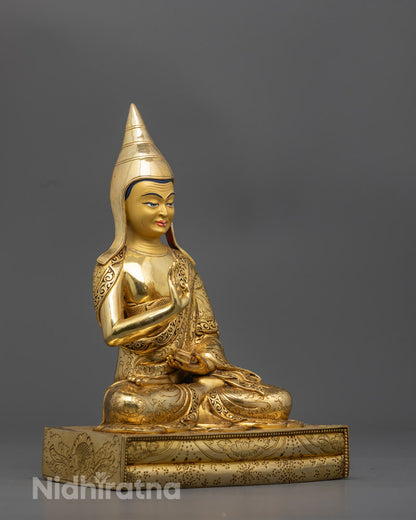 side view Tibetan monk Santaraksita sculpture showing intricate robe motif patterns