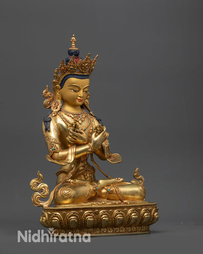 side view Vajradhara tantric Buddha statue holding vajra and bell on lotus moon disc seat
