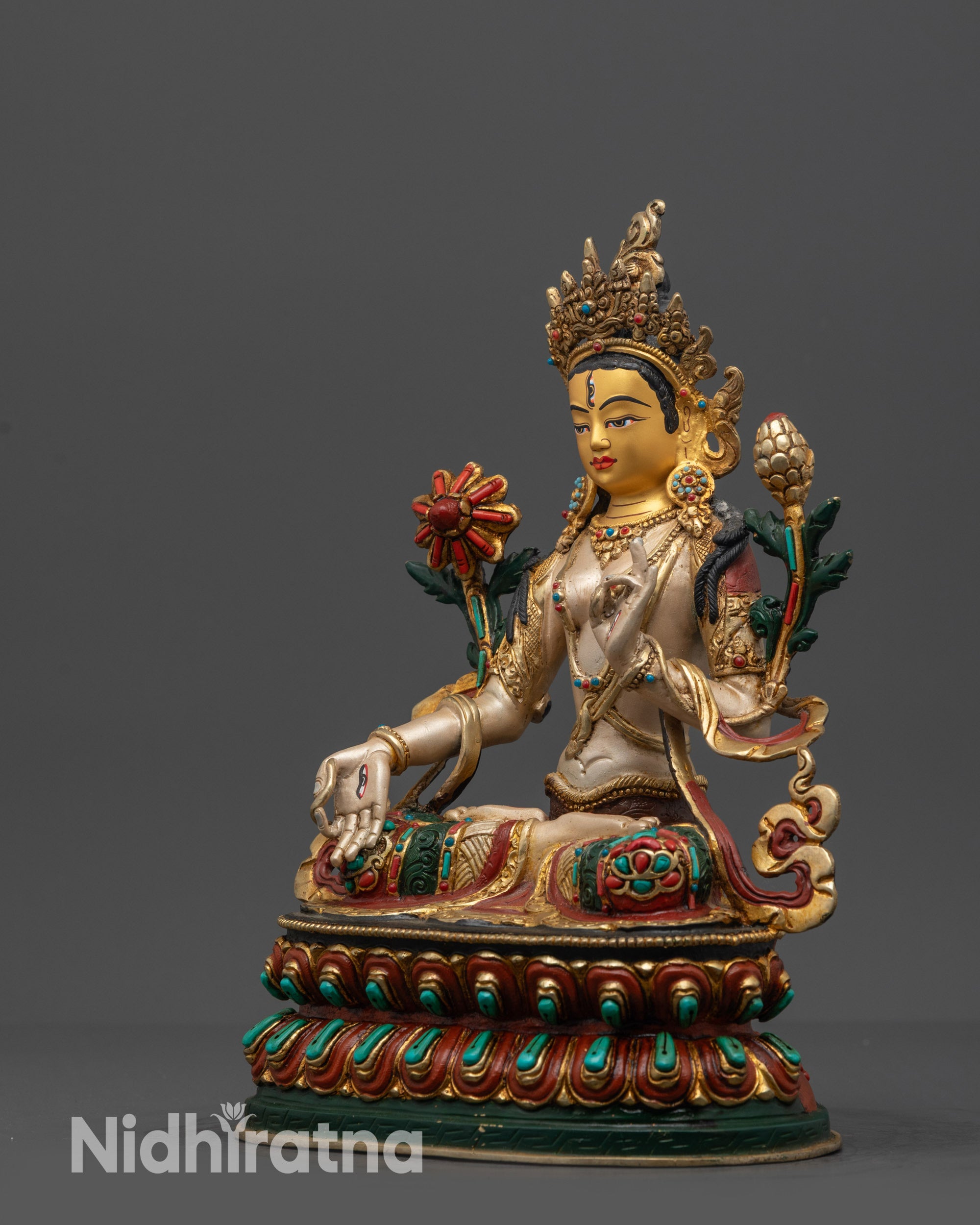 side view White Tara sculpture with robe, semi-precious stones and lotus seat
