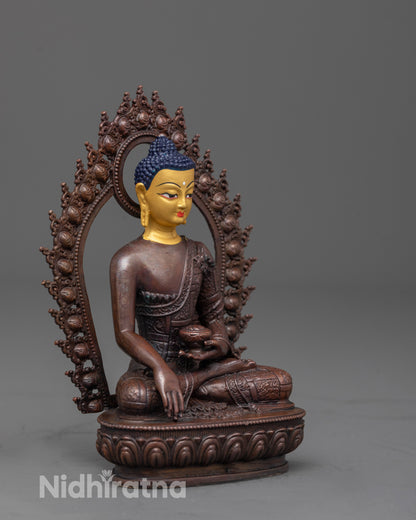 side view of Buddha Shakyamuni statue holding Patra bowl and seated on lotus with halo