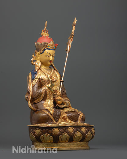 side view of handcrafted tsokye dorje statue with tripitaka robe and carved patterns