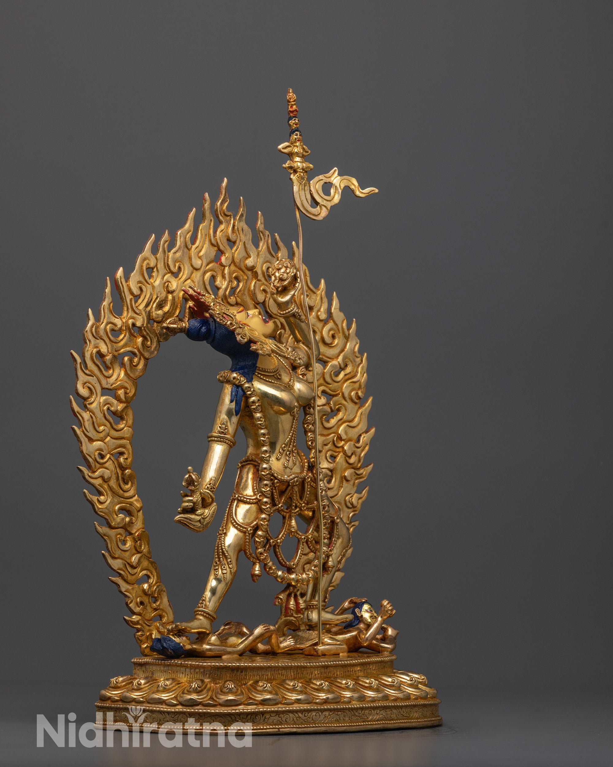 side view of handmade Vajrayogini statue highlighting dynamic posture and flowing robes