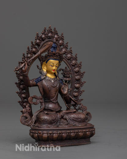 side view of manjushri statue showing flowing robes five-jeweled crown and radiant halo