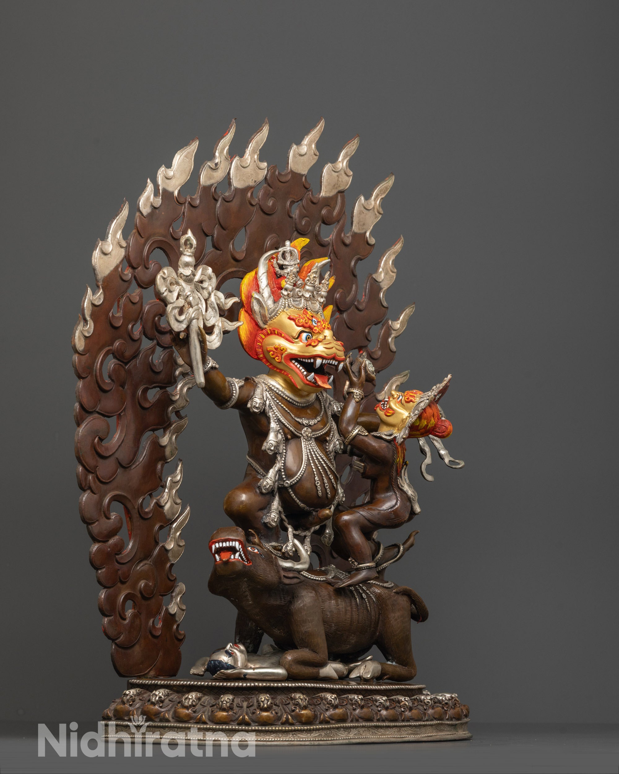 side view of premium yamantaka consort statue with katvanga staff and silver-plated halo