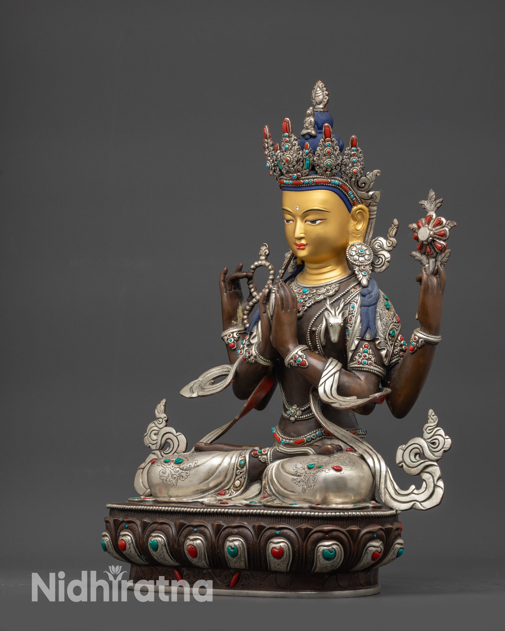 side view oxidized Chenrezig Avalokiteshvara statue seated in padmasana on lotus pedestal