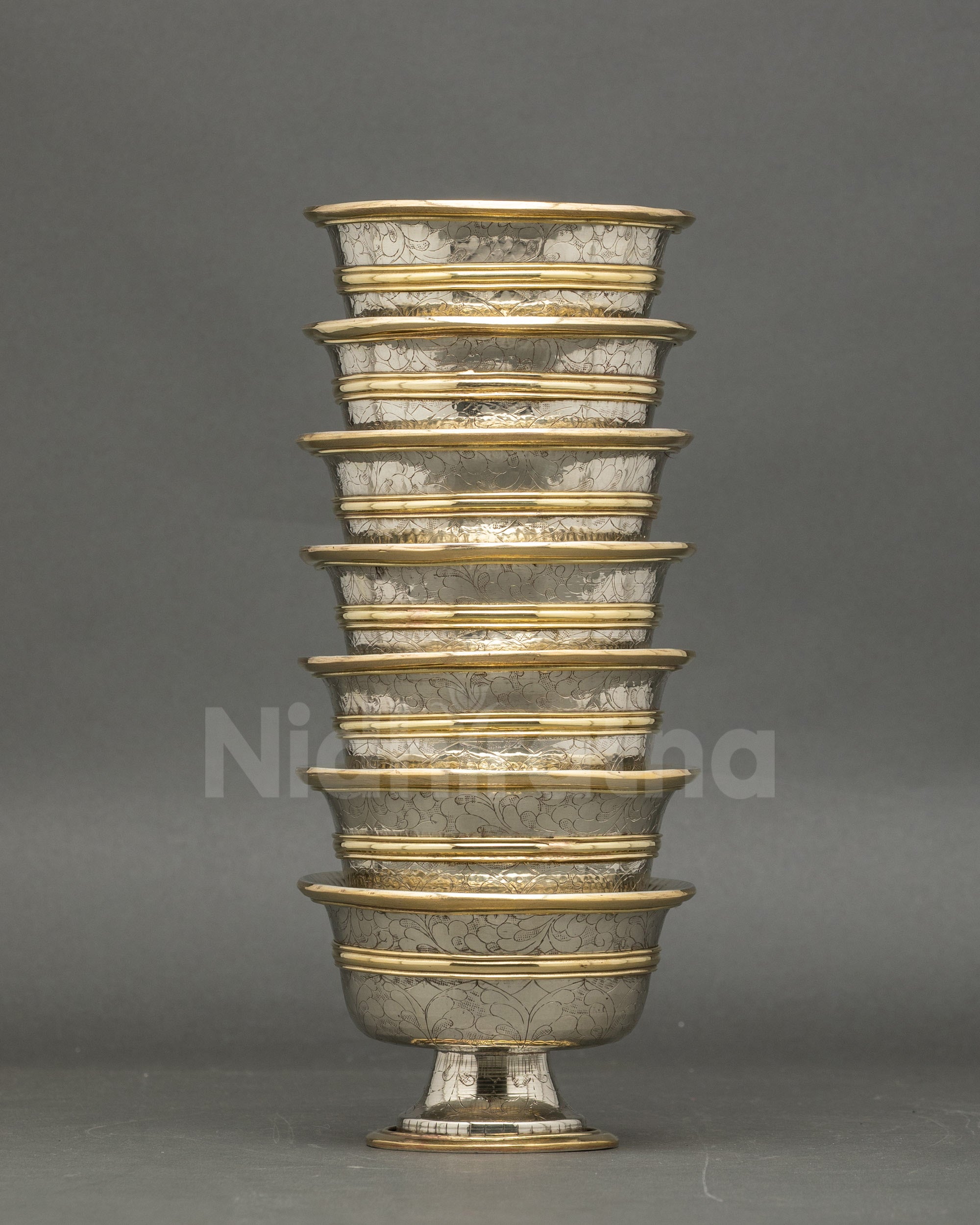 silver Himalayan water offering bowls for Tibetan puja and meditation practice