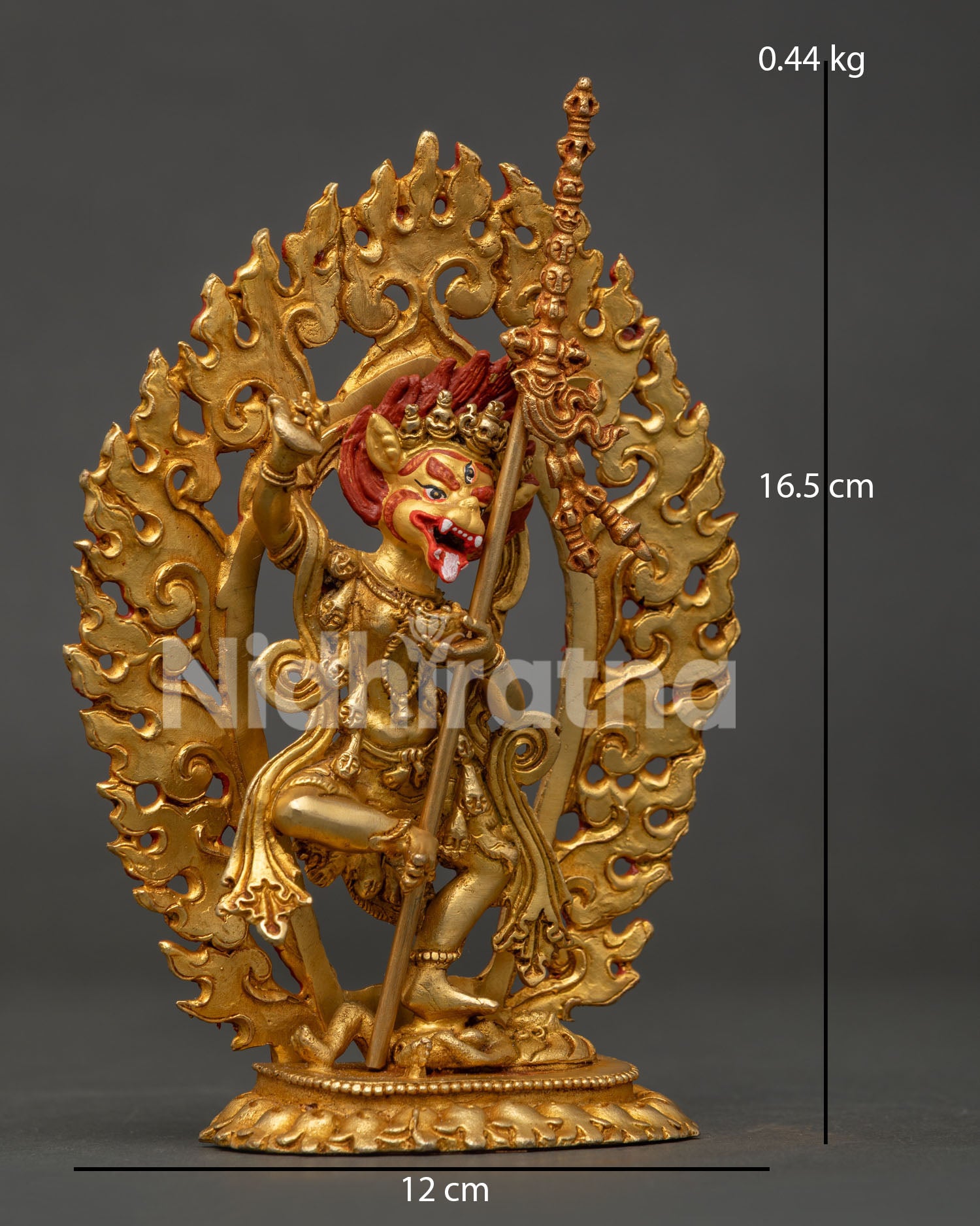 Simha mukha statue standing on subdued figure with kartika and kapala.