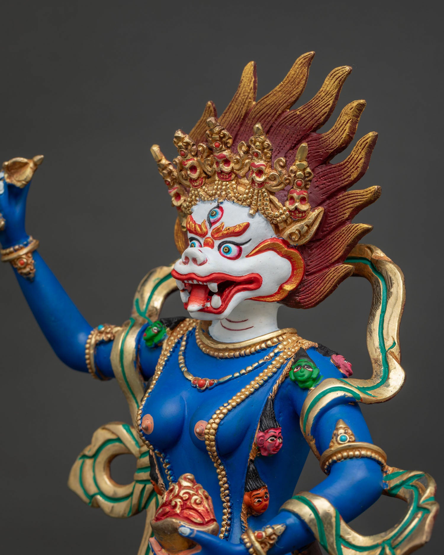 Simhamukha Statue Thailand detailed side close up, kartika knife, skull cup and flaming halo