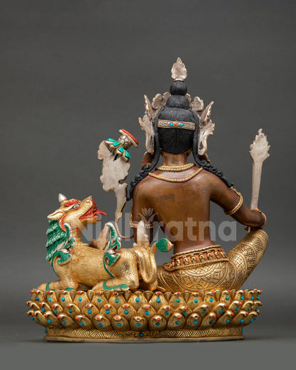 Simhanada Manjushri statue back view lotus throne snow lion detail copper oxidized Nepal