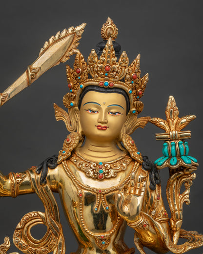 Simhanada Manjushri statue close-up view highlighting gold-gilded copper craftsmanship