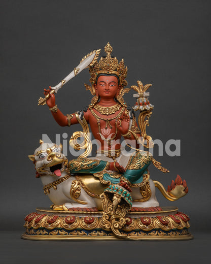 Simhanada Manjushri statue handcrafted in Nepal with gold gilding and gemstones