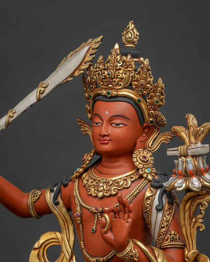 Simhanada Manjushri statue showing ornate jewelry and gold gilded details