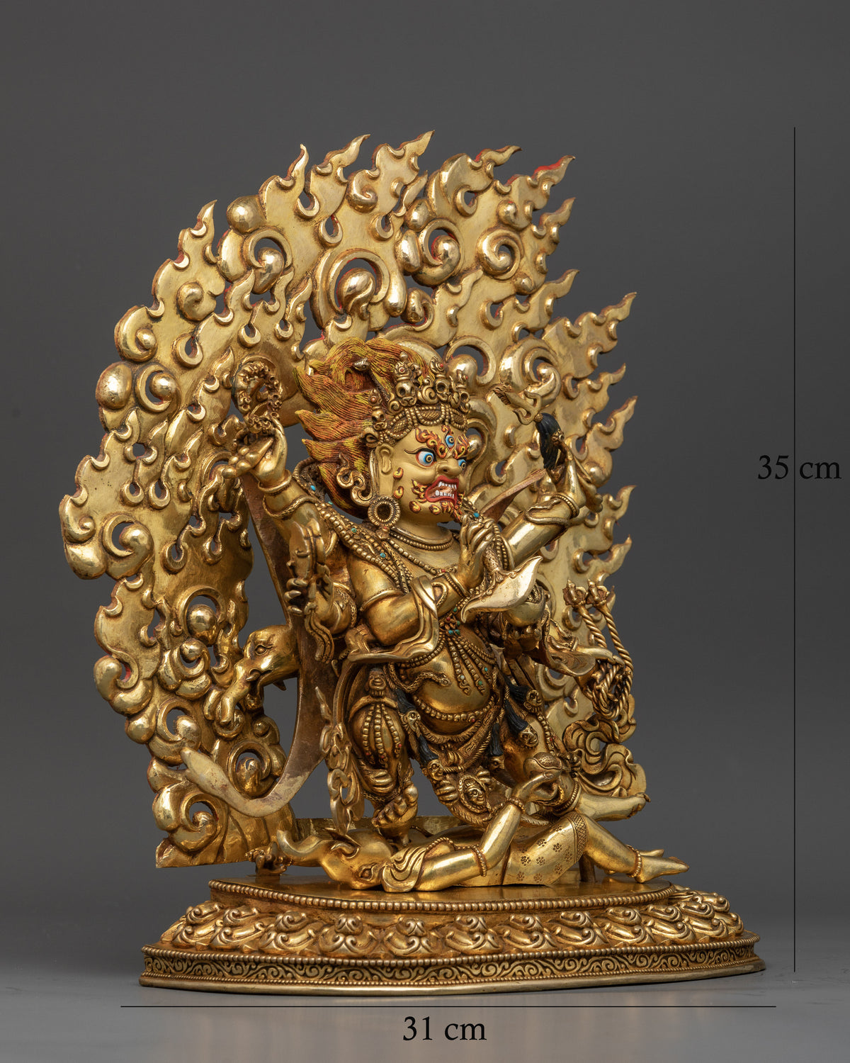 Six-Armed Mahakala holding skull rosary damaru lasso trident skull cup and kartika.