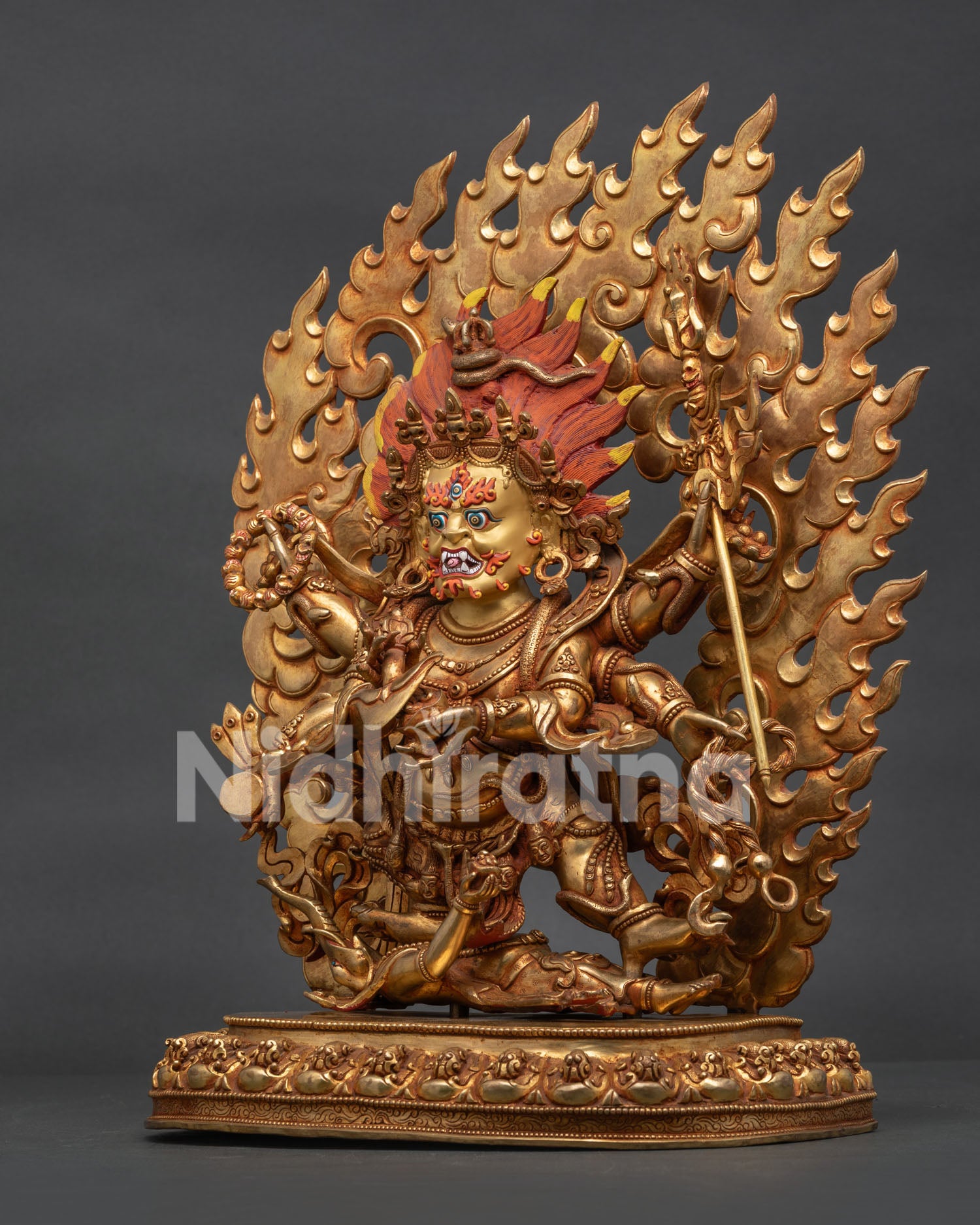 Six-Armed Mahakala sculpture with damaru trident skull cup lasso and skull rosary