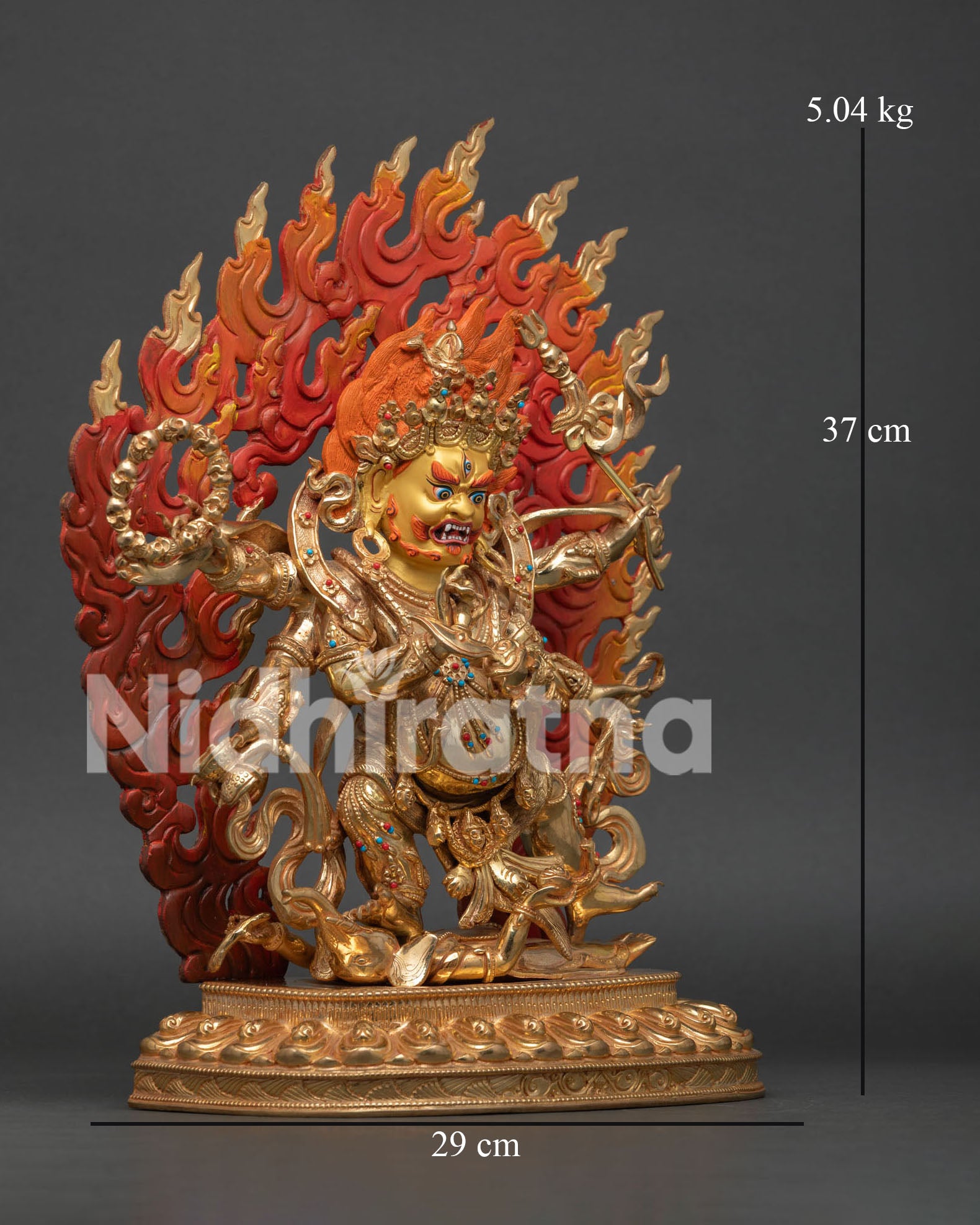Six-Armed Mahakala statue, displays the trident, skull cup, damaru, lasso, and skull rosary with intricate carvings