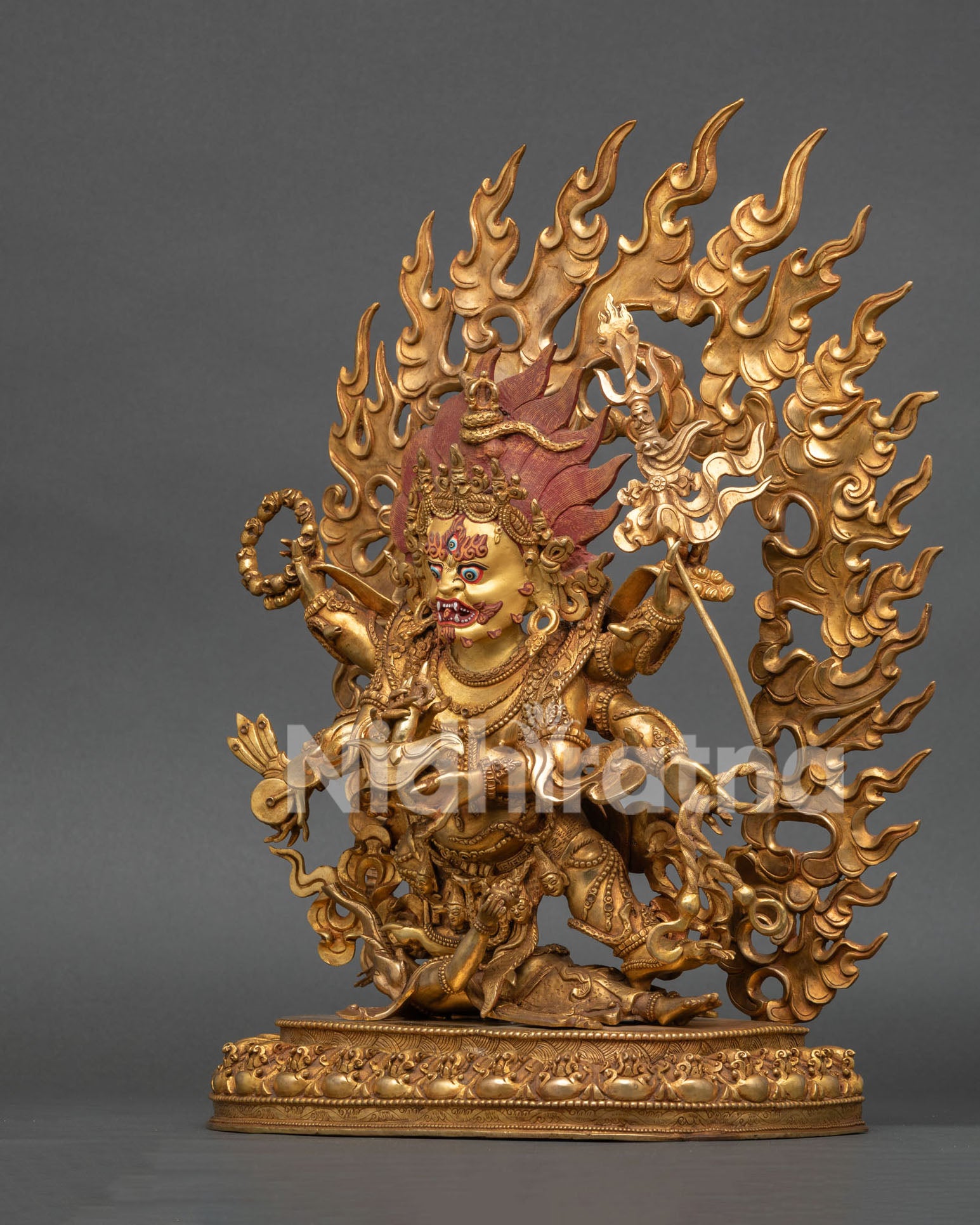 Six Armed Mahakala Statue standing on lotus pedestal with blazing flames and intricate details