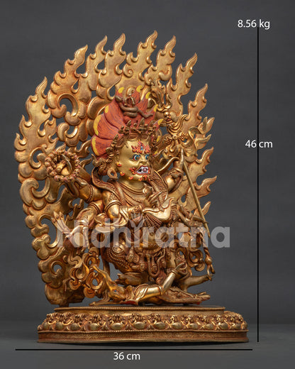 Six-Armed Mahakala statue standing upon a subdued figure with sacred ritual attributes