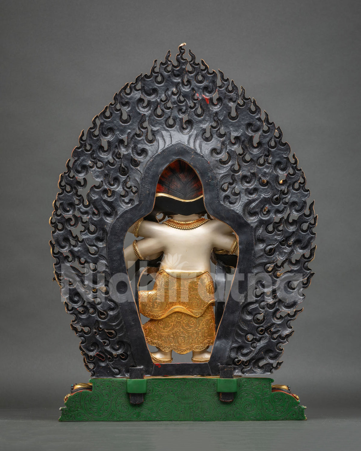 Six-armed White Mahakala Buddhist statue with trident, kartika knife, damaru and skull cup