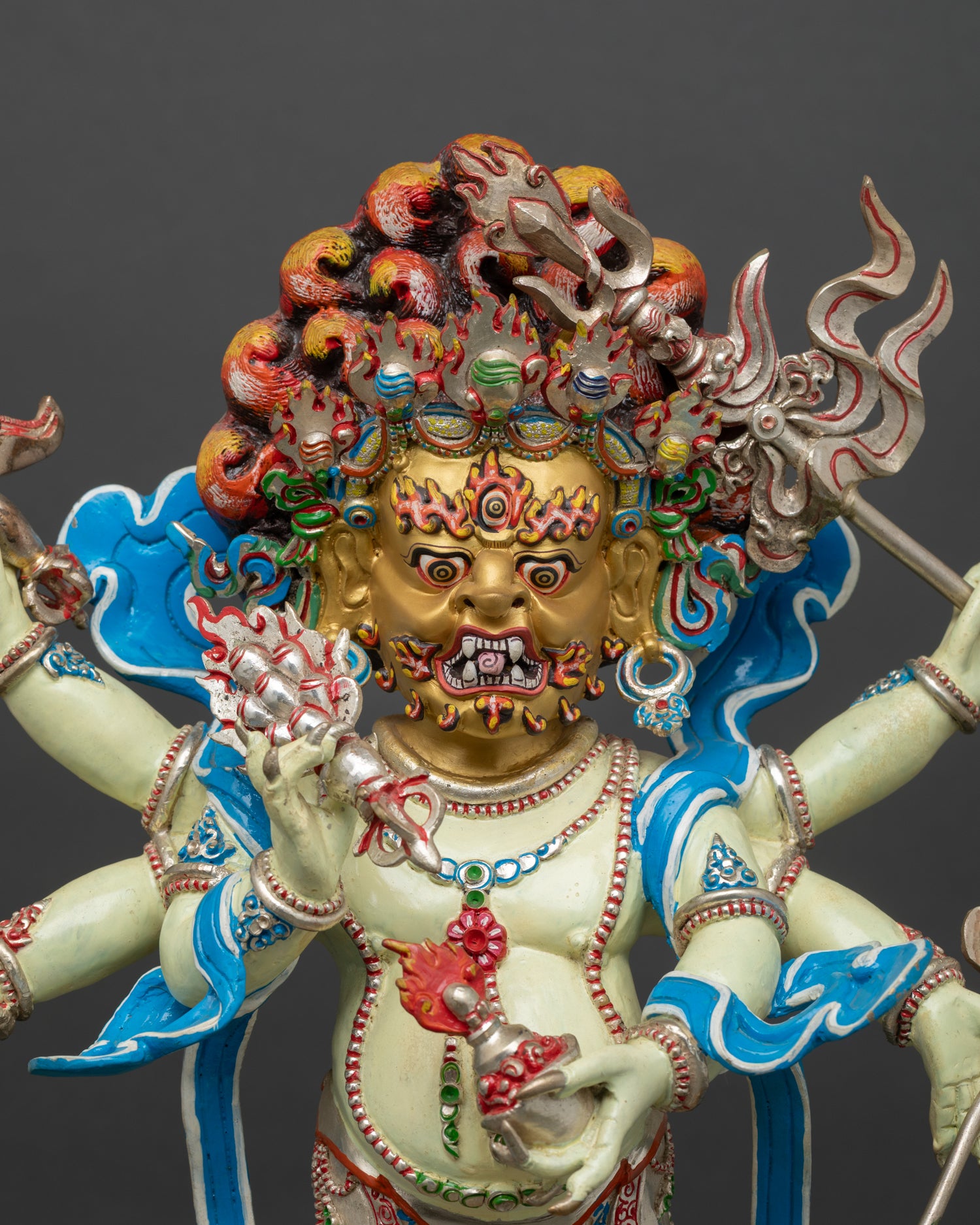 Six-Armed White Mahakala Statue – front view, acrylic body, blue drapery, flame aureole