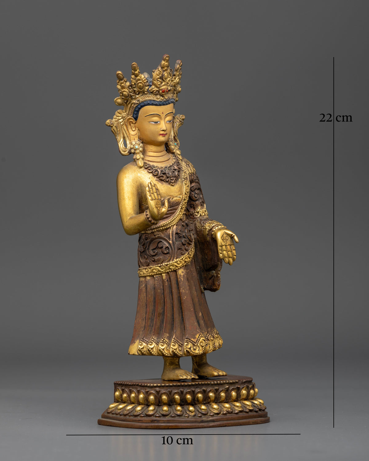 Standing Dipankara Buddha statue on a lotus pedestal symbolizing purity and spiritual awakening with traditional Nepalese craftsmanship.