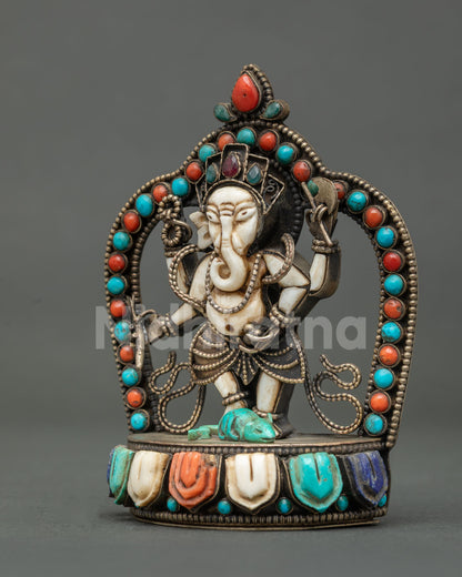 standing ganesh sculpture holding axe rosary tusk and sweet on precious stone lotus seat
