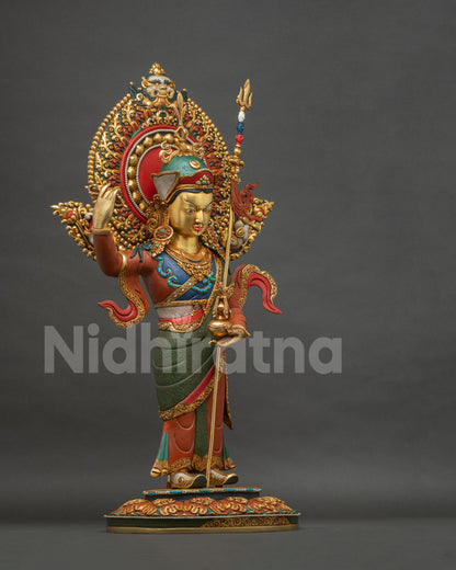 Standing Guru Rinpoche Padmasambhava statue, right side profile view