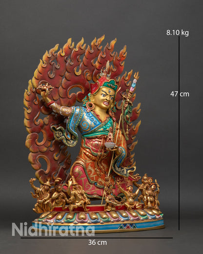 Standing Guru Rinpoche side view handcrafted lost wax copper statue with gold gilded detailing Vajrayana Buddhist protector artwork from Kathmandu Valley.