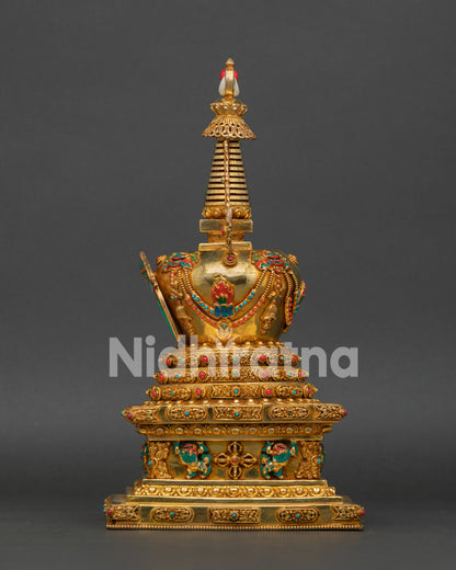 Stupa Adorned with Semi-Precious Stones and Intricate Engravings