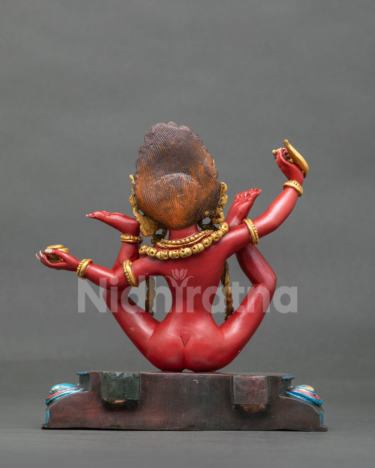 Sukhasiddhi Statue back view flaming aureole lotus seat acrylic details.
