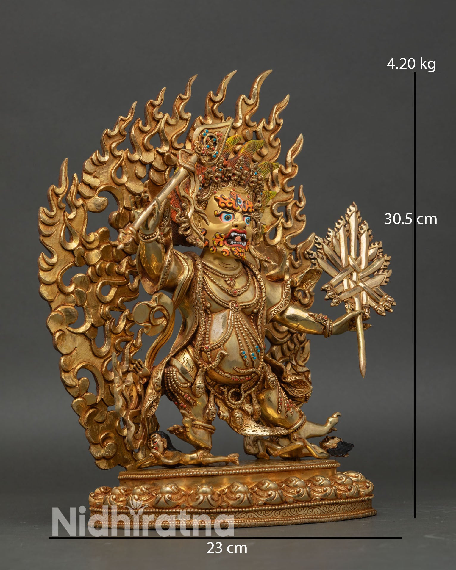 Takla Mebar statue side view lost wax cast Nepal handmade wrathful protector holding ritual implements
