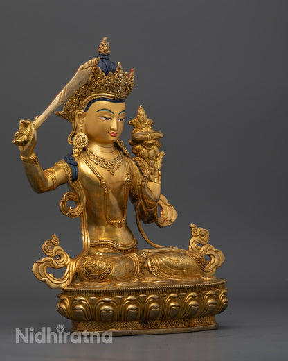 the Manjushree statue showcasing exquisite craftsmanship and the serene lotus throne, with Manjushree holding the sacred text of wisdom.