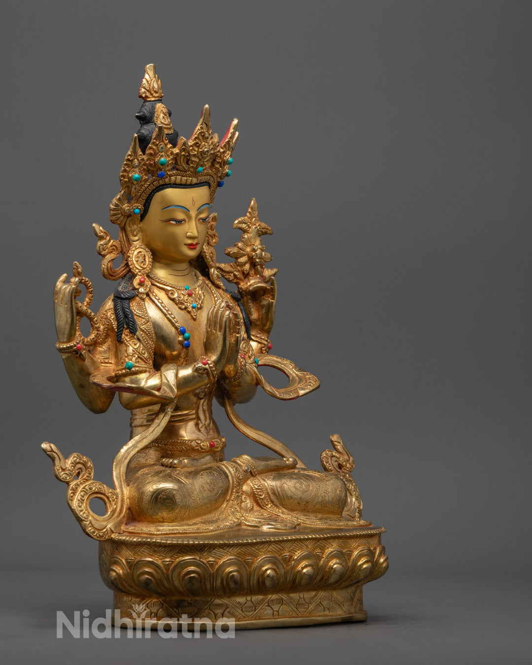 the crown, jewelry, and lotus throne on handmade Tibetan Chenrezig Statue