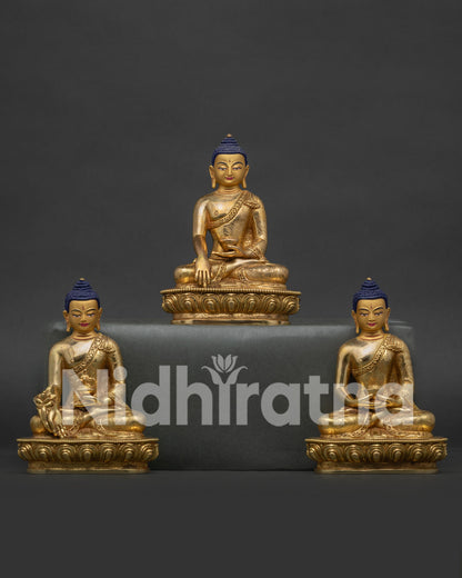 Three Buddha Set Statue handcrafted in Nepal with 24K gold fire gilding and intricate floral motifs
