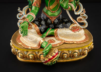 Three‑quarter angle of Green Tara radiating serenity and reassurance in meditation posture