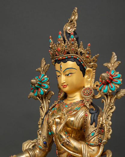 Three-quarter right view of White Tara statue with ornate crown and sacred ornaments