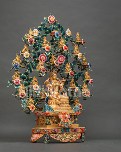 Three-quarter view of 21 Tara Statue Set with Green Tara under a wish-fulfilling tree