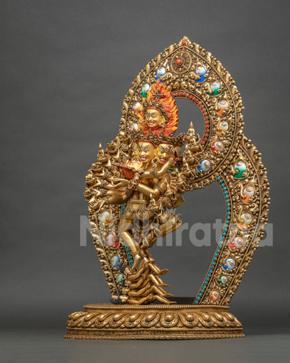 Three-quarter view of dancing Hevajra Yab-Yum statue, 24K gold fire-gilded copper sculpture