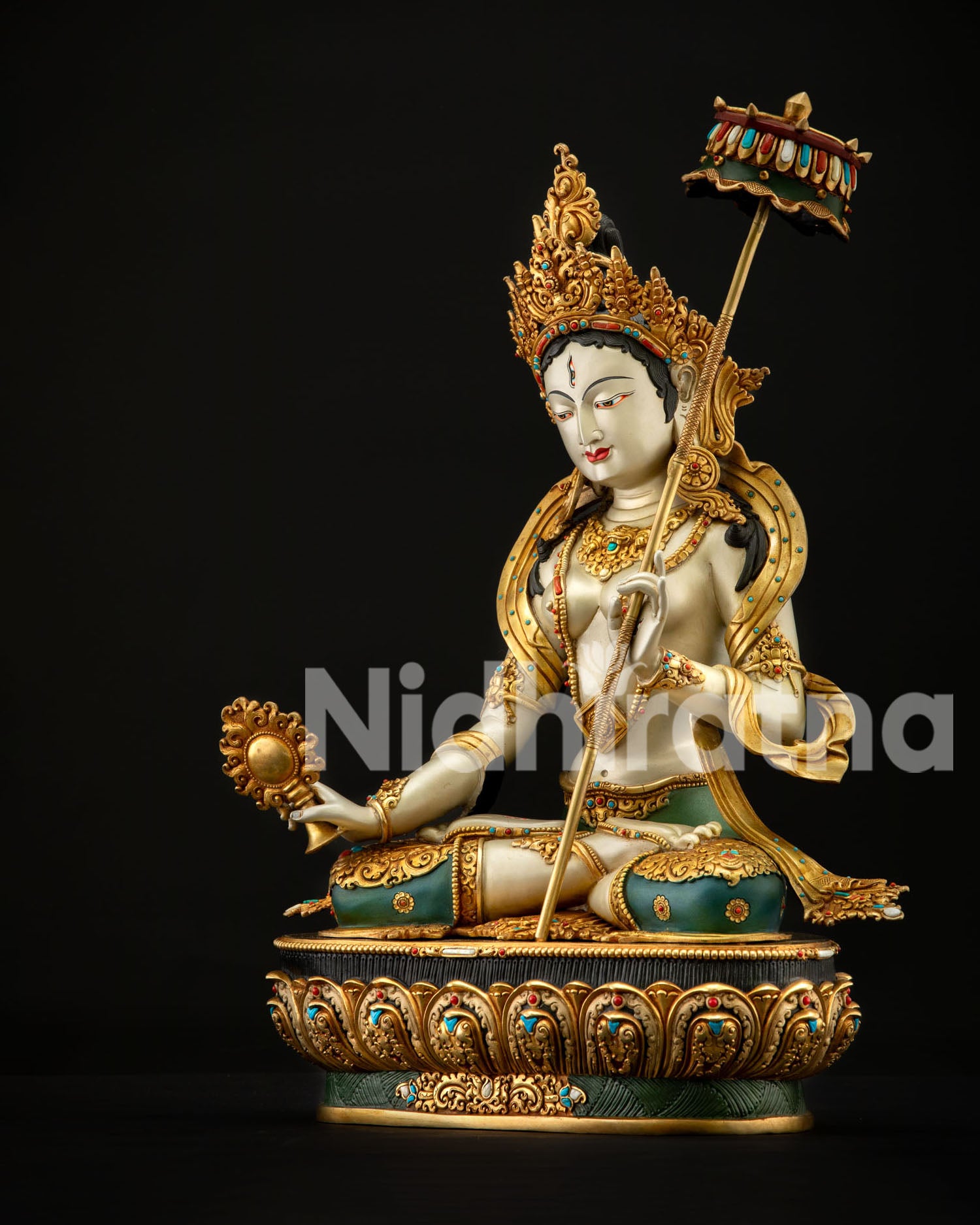 Three-quarter view of Dukar Sitatapatra copper statue with White Parasol and Dharma Wheel