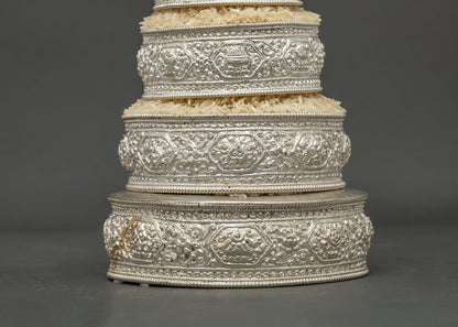 Tibetan Buddhist Mandala set with handcarved floral motifs for traditional offering practice.