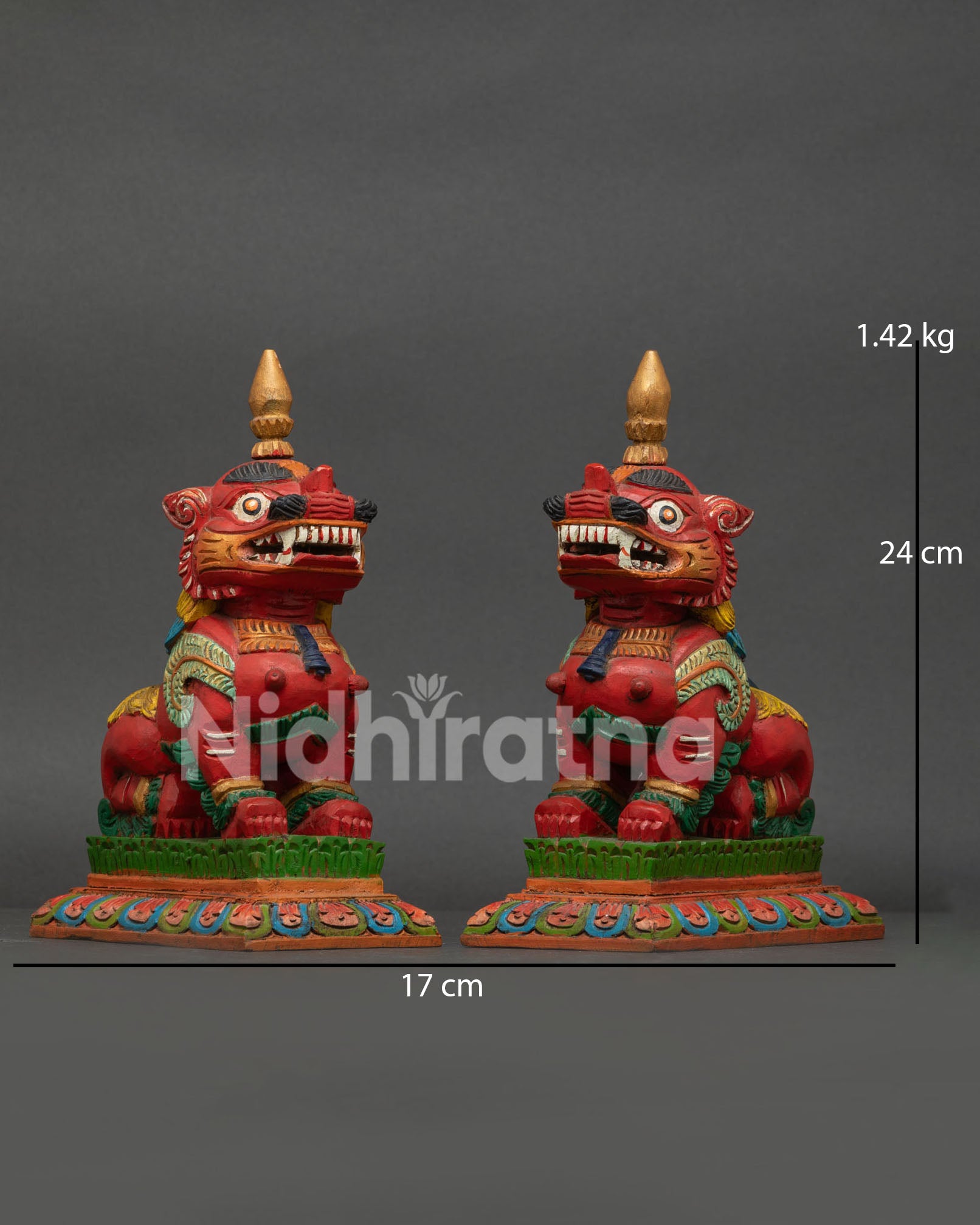 Tibetan Buddhist snow lion pair symbolizing strength courage and protection